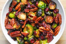 Brussels sprouts become a crowd favorite when they're smothered in balsamic and topped with homemade bacon bits. Brussels Sprouts With Bacon Pecans And Cranberries Julia S Album