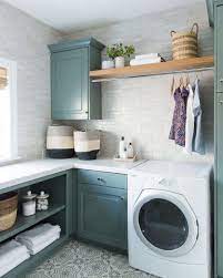 A woven basket and rug of natural textures complete the look that is a throwback to a time of washboards, washtubs and lye soap. 10 Favorite Laundry Rooms With Storage Ideas To Steal