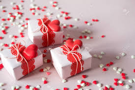 Pick up hints from your recent conversations about your. Packing Valentine S Day Gifts Handmade Gift Boxes And Decorations On Pink Background With Sprinkles Top View Stock Photo Picture And Royalty Free Image Image 94655281