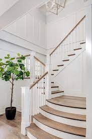Use an old rag and wipe down the surface with a deglosser. White And Brown Staircase Design Ideas