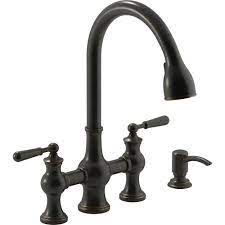 Whether renovating a quaint cottage in the country side or just remodeling a master bath the ashfield collection is guaranteed to be the perfect complement to. Kohler Capilano 2 Handle Bridge Farmhouse Pull Down Kitchen Faucet With Soap Dispenser And Sweep Spray In Oil Rubbed Bronze K R21070 Sd 2bz The Home Depot