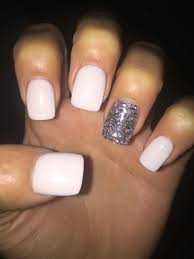 We rounded up the best acrylic nail kits that will have you skipping the salon for good. White Acrylic With Silver Sparkly Acrylic Sparkly Acrylic Nails Square Acrylic Nails Short Square Acrylic Nails