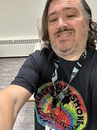 Got my merch bundle yesterday and of course had to wear the new shirt to  work. 3 weeks from tomorrow will see the band in Mexico . I can't wait