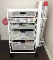 Pin By The Container Store On Gift Wrap Gift Wrap Organization Craft Room Office Wrapping Paper Organization