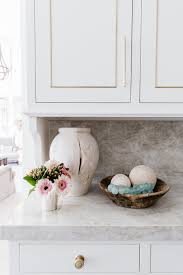 Countertops will be quartz nouveau now my dilemma is, should i go with satin nickel handles or gold hardware? Use Knobs Or Pulls For Unique Kitchen Cabinet Hardware Bluegraygal