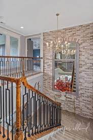 Whether you love the modern look of cable rail. Light Brick Accent Wall Above Stairs Jennifer Allwood Home Staircase Design Brick Accent Wall Staircase Wall Decor
