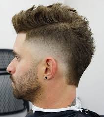 All of these haircuts feature a strip of hair down the center and shaved sides but that's where the similarities end. 40 Attractive Mohawk Fade Haircuts Charming Style With Creative Details Mohawk Hairstyles Men Mohawk Hairstyles Mens Hairstyles Thick Hair