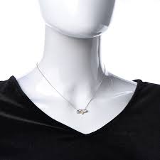 Maybe you would like to learn more about one of these? Tiffany Platinum 18k Yellow Gold Diamond Fancy Yellow Diamond Paper Flowers Firefly Pendant Necklace 481327 Fashionphile