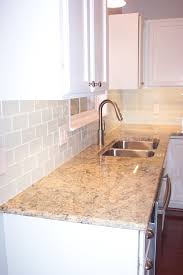 white glass subway tile kitchen