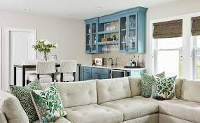 It may not be something that you use all the time but it'll surely be a handy option when you need it. Open Plan Space With Sectional And Wet Bar Transitional Dining Room