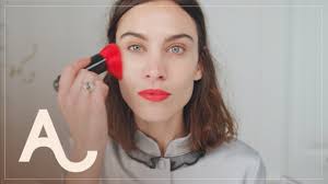 alexa chung does her makeup in a rush