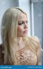 Beautiful Blond Woman with Blue Eyes Stock Photo