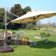 Top brands ✓ free uk delivery on eligible orders* ✓ shop now. Octagonal Tilting Cantilever Parasol Bonnington 350cm Rattan And Teak