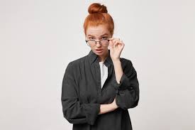 Yet another half and half look you can go for is black and red. Free Photo A Young Red Haired Girl Dressed In A Black Men S Shirt Is Looking At The Camera