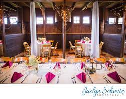 Jaclyn Schmitz Photography Horse Stall Wedding Reception Barn Venue Vermont The Co Indoor Rehearsal Dinner Barn Wedding Reception Rustic Wedding Table Decor