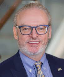 AIG Fires Interim CFO Lyons