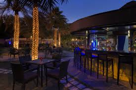 The Lazy Lizard Pool Bar Night Time Muscat City Hotel Pool Bar
