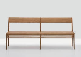 Cb2's principle bench has a raw steel frame and a seat and back of solid acacia wood with a matte light brown stain; Pin On Furniture Table