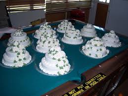 Every Table Had Their Own Wedding Cake To Share There Were 4 Flavors Chocolate Spice Lemon And Vanilla Everyone Went From T Cake Wedding Cakes Chocolate