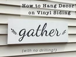 How To Hang Decor On Vinyl Siding With No Drilling New England Lifestyle Motherhood Diy Birch Landing Home Vinyl Siding Deck Sign Patio Signs