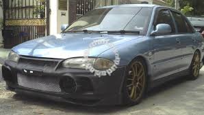 Proton wira 1995, engine gasoline 1.5 liter., 88 h.p., front wheel drive, manual — owner review. Proton Wira Baru Stay Home Stay Safe