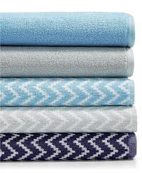 A full bath towel that has two layers of fabric in the sassy monogram style and a personalized name in the middle. Dkny Petals 5 Piece Bath Towels Set