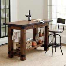 Modeled after ballard catalogue island, wood top, turned legs, center cabinet with drawers #ballard_designs #butcher_block #kitchen_island Tripoli Kitchen Island
