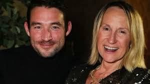 Loose Women's Carol McGiffin glows in waist-cinching wedding anniversary  dress with husband Mark
