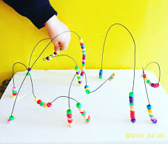 Diy Bead Rollercoaster All You Need Is A Piece Of Styrofoam Florist Wire Fine Motor Skills Activities Fine Motor Skills Development Motor Skills Activities