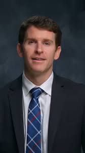 Amr Mohsen, MD (left), and Jason Hoff, MD (right), reunited with patient  Donald Oaks and his wife (center) outside of Loma Linda University Medical  Center. The cardiologists partnered with Oaks to perform