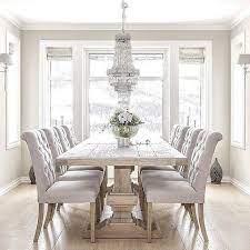 What An Awesome Dining Room Love The Pale Grey Colors With All The Natural Light And That Chandelier Is Ju Luxury Dining Room White Dining Room Luxury Dining