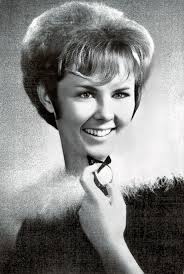 Can someone please help fix this?This is my mom when she graduated she had  passed day after Christmas I would love a good copy it was one of her  favorites