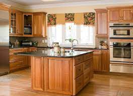 The island is 12 feet long and has honey oak cabinets on both sides (the gas cooktop is in the island). 21 Things That Make Any House Feel Old And Outdated Bob Vila