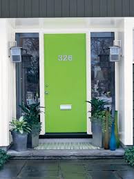 White house black trim green door. 59 Inviting Colors To Paint A Front Door Colorful Front Doors Hgtv