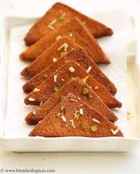 Bread Kaja Recipe With Step By Step Photos Dessert Recipes With Bread Recipe Easy Indian Sweet Recipes Quick Sweets Indian Sweets