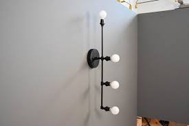 Modern Bathroom Light Industrial Vanity Light Matte Black Etsy Modern Bathroom Lighting Bathroom Wall Light Fixtures Wall Lights We carefully selected the top products with the best reviews.