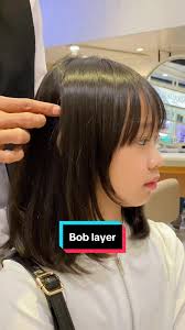 Long Bob Haircut with Wispy Bangs for Square Face