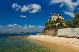 Ouranoupolis has a view to the aegean sea and the athonian bay, standing at the foot of the imposing mount athos which stands out like a giant that just emerged from the mediterranean sea. Ouranoupolis Village Halkidiki