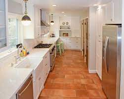 Kitchen tiles kitchen flooring kitchen cabinets kitchen decor kitchen paint kitchen colors kitchen appliances apron sink kitchen farmhouse flooring. Beautiful Modern Kitchen With Terracotta Colored Tile Flooring Beautiful Piedmont Kitchen Design Tile Floor W Kitchen Flooring Kitchen Remodel Kitchen Design
