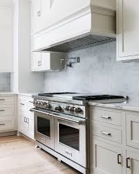 Learn all about cabinets door styles and drawers with our 101 guide and choose discount kitchen cabinets there are many types of kitchen cabinets, materials, finishes, kitchen cabinet doors, and kitchen cabinet drawers to choose from. Pot Filler Or No Pot Filler What S Your Thoughts On That For A New Kitchen Property M Stone Backsplash Kitchen Marble Tile Kitchen Kitchen Niche