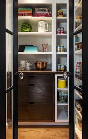 This is a full lite safety tempered glass door that features pantry text and design on the glass that will add instant style and charm to your kitchen and pantry area within the home. Black Metal And Glass Bi Fold Pantry Doors Transitional Kitchen