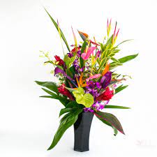 Shown here are exotic hawaiian plants like gingers, calatheas, and heliconias with large, beautiful, tropical flowers. Tropical Supreme Flower Assortment 26 Stems Hawaiian Flowers