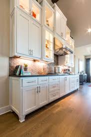 This is a list of definitions and terminology of kitchen parts and the set back or cutout at the bottom of a cabinet that allows room for feet when standing in front of the. Burrows Cabinets Kitchen With Shaker Doors In Bone White And Dallas Feet Kitchen Wardrobe Kitchen Cabinets With Feet Wardrobe Cabinets