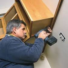 Home Improvement And Remodeling This Old House Installing Cabinets Hanging Kitchen Cabinets Diy Kitchen Cabinets