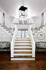 Double Sided Staircase Cottage Staircase Design Grand Staircase Coastal Living Rooms