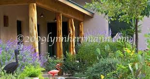 A clear finish will allow cedar to keep the golden color it has using cedar logs as porch supports will allow you to bring a rustic feel to the exterior of your home in a unique manner. Cedar Trees For Porch Posts Cedar Porch Posts Image Search Results House Design Photos House Design Cob House