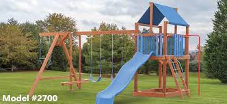 Outdoor playset with bridge to redwood fort, spiral slide, and a connecting monkey bar fun. Kids Wooden Playsets Maryland Baltimore Annapolis Backyard Billys