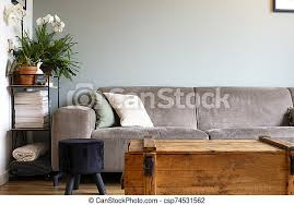 What furniture trends will be in 2021? Modern Retro Light Living Room With Grey Sofa And Various Colored Pillows Current Trend Wooden Box Table Canstock