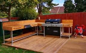 This outdoor patio kitchen/bar features a barbecue, sink and refrigerator. Outdoor Kitchen Bbq Furniture Bbq Area Bbq Kitchen Garden Bar Ebay