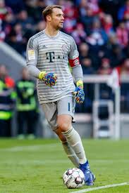 Muenchen Germany February 23 Goalkeeper Manuel Neuer Of Bayern Muenchen Controls The Ball During The Bundesliga Match Betw Bayern Goalkeeper Bayern Munchen